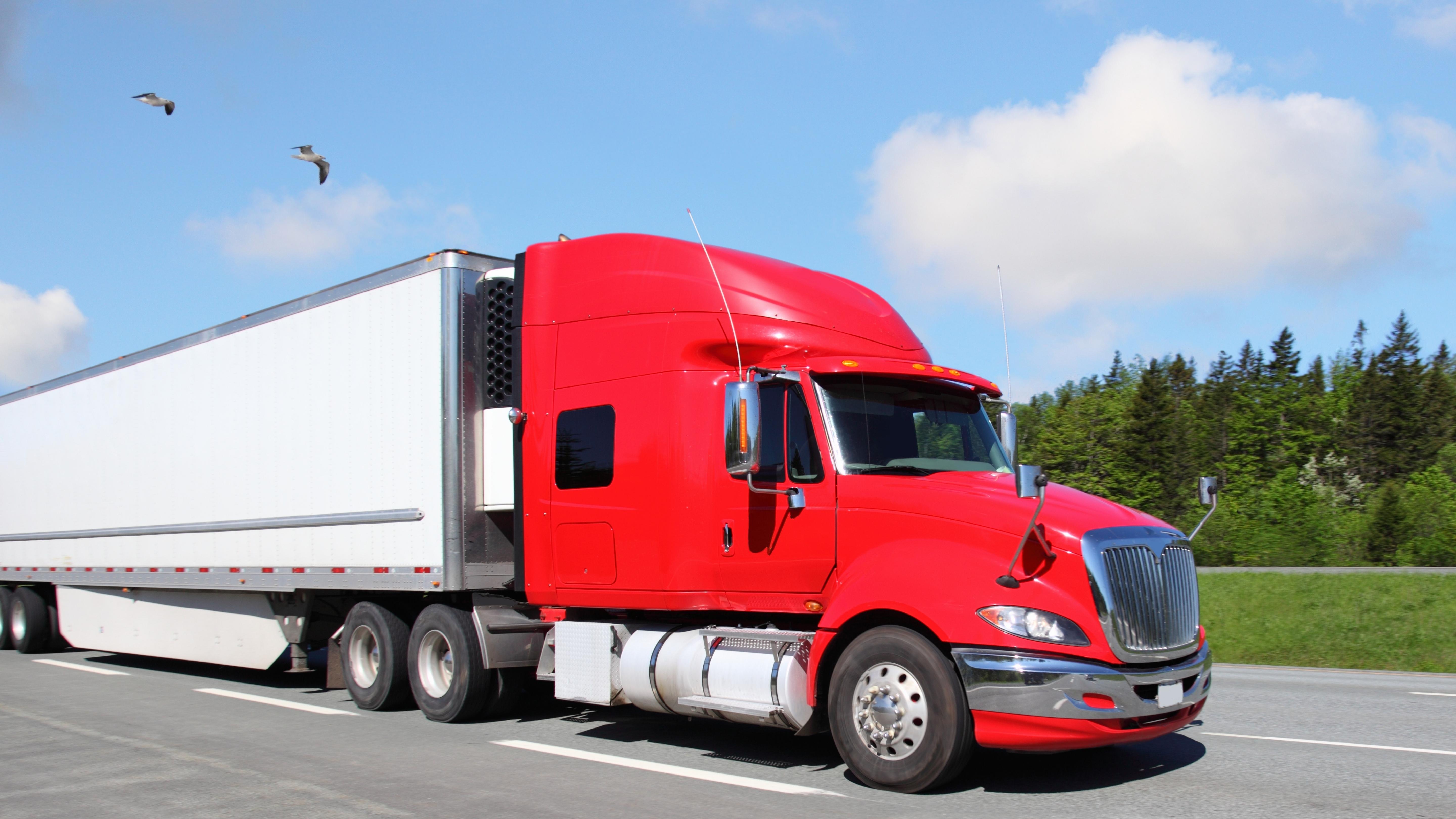 Enclosed transport trailer providing premium protection for high value vehicles